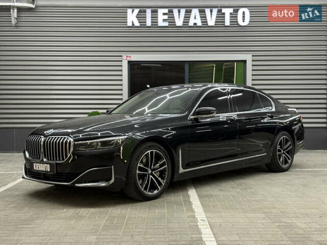 Черный БМВ 7 Серия, объемом двигателя 4.4 л и пробегом 115 тыс. км за 46000 $, фото 1 на Automoto.ua