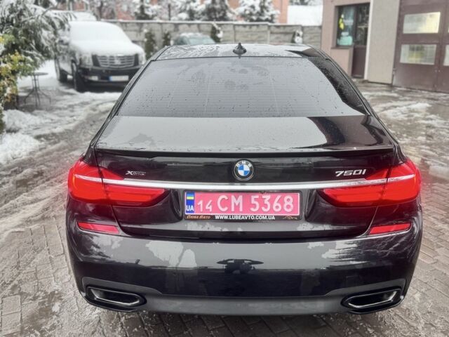 Чорний БМВ 7 Серія, об'ємом двигуна 4.4 л та пробігом 56 тис. км за 25800 $, фото 1 на Automoto.ua
