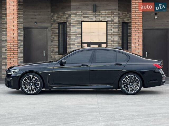 Черный БМВ 7 Серия, объемом двигателя 2.99 л и пробегом 23 тыс. км за 95000 $, фото 1 на Automoto.ua