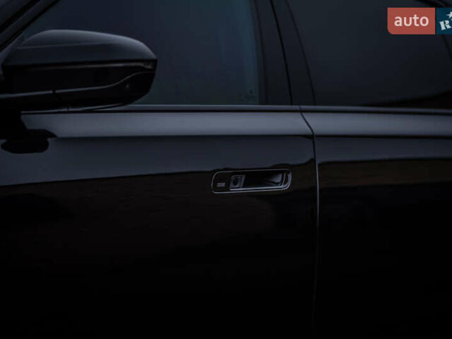 Черный БМВ 7 Серия, объемом двигателя 2.99 л и пробегом 89 тыс. км за 120000 $, фото 1 на Automoto.ua