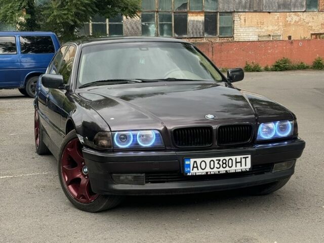 Фіолетовий БМВ 7 Серія, об'ємом двигуна 3 л та пробігом 380 тис. км за 3700 $, фото 1 на Automoto.ua