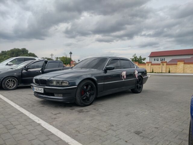 Серый БМВ 7 Серия, объемом двигателя 5.4 л и пробегом 350 тыс. км за 10000 $, фото 1 на Automoto.ua