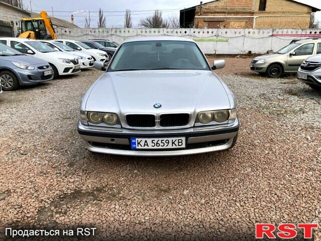 Серый БМВ 7 Серия, объемом двигателя 3.5 л и пробегом 287 тыс. км за 3000 $, фото 1 на Automoto.ua