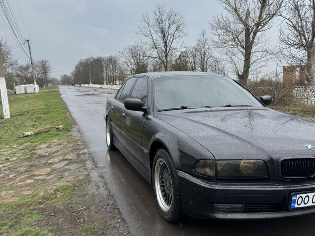 Серый БМВ 7 Серия, объемом двигателя 3.5 л и пробегом 230 тыс. км за 4300 $, фото 1 на Automoto.ua