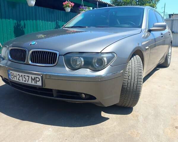 Серый БМВ 7 Серия, объемом двигателя 4.4 л и пробегом 302 тыс. км за 7600 $, фото 1 на Automoto.ua