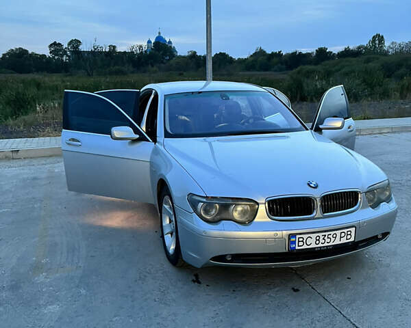 Серый БМВ 7 Серия, объемом двигателя 4 л и пробегом 333 тыс. км за 6200 $, фото 1 на Automoto.ua