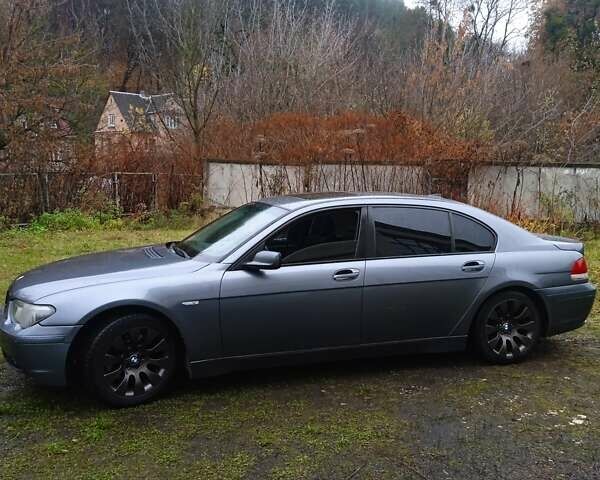 Серый БМВ 7 Серия, объемом двигателя 4.4 л и пробегом 300 тыс. км за 6000 $, фото 1 на Automoto.ua