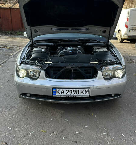 Серый БМВ 7 Серия, объемом двигателя 3.5 л и пробегом 315 тыс. км за 5500 $, фото 1 на Automoto.ua