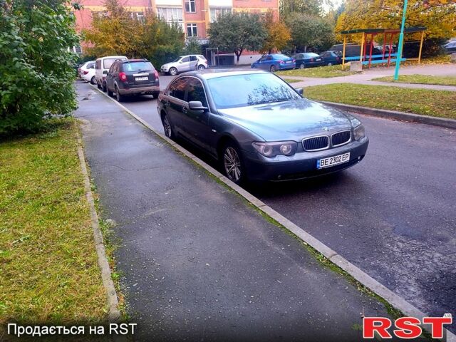 Серый БМВ 7 Серия, объемом двигателя 3.5 л и пробегом 311 тыс. км за 9000 $, фото 1 на Automoto.ua