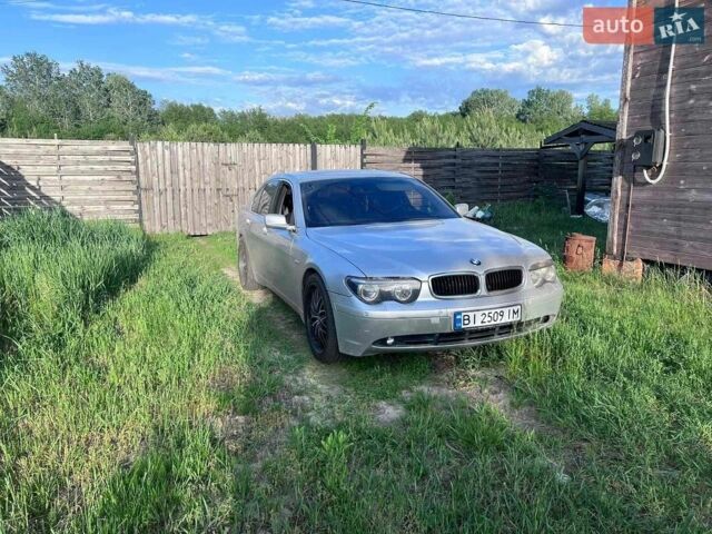 Серый БМВ 7 Серия, объемом двигателя 3.6 л и пробегом 370 тыс. км за 5000 $, фото 1 на Automoto.ua