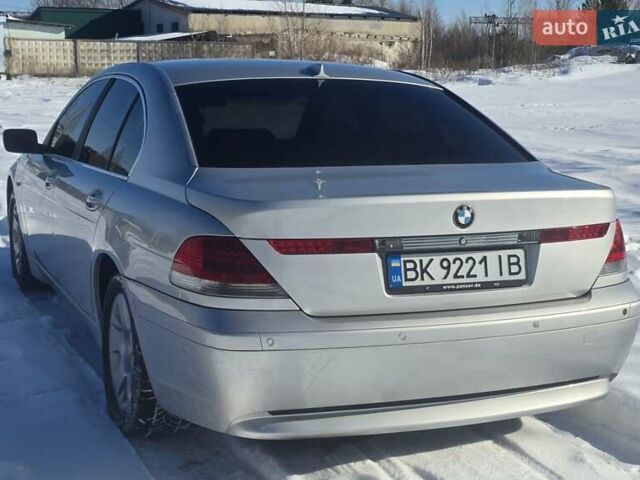 Серый БМВ 7 Серия, объемом двигателя 3.9 л и пробегом 380 тыс. км за 6900 $, фото 1 на Automoto.ua