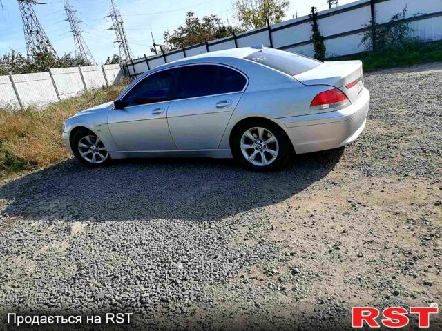 Серый БМВ 7 Серия, объемом двигателя 4.4 л и пробегом 210 тыс. км за 7500 $, фото 1 на Automoto.ua