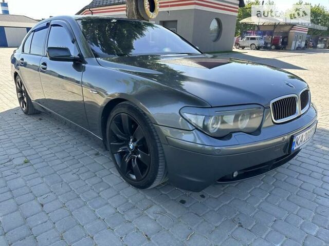 Серый БМВ 7 Серия, объемом двигателя 2.99 л и пробегом 370 тыс. км за 9700 $, фото 1 на Automoto.ua