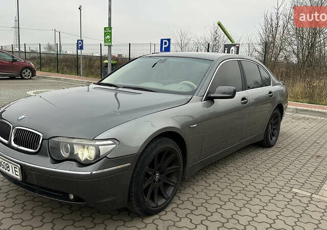 Серый БМВ 7 Серия, объемом двигателя 2.99 л и пробегом 311 тыс. км за 5500 $, фото 1 на Automoto.ua