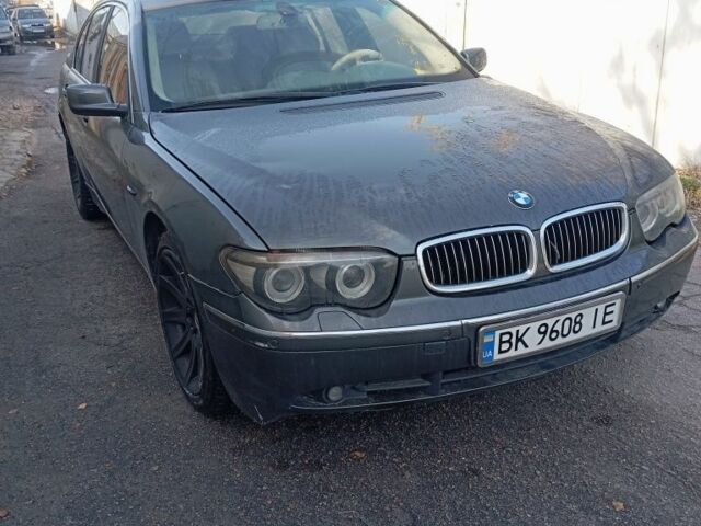 Серый БМВ 7 Серия, объемом двигателя 3 л и пробегом 320 тыс. км за 6200 $, фото 1 на Automoto.ua