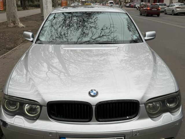 Серый БМВ 7 Серия, объемом двигателя 3 л и пробегом 305 тыс. км за 5800 $, фото 1 на Automoto.ua