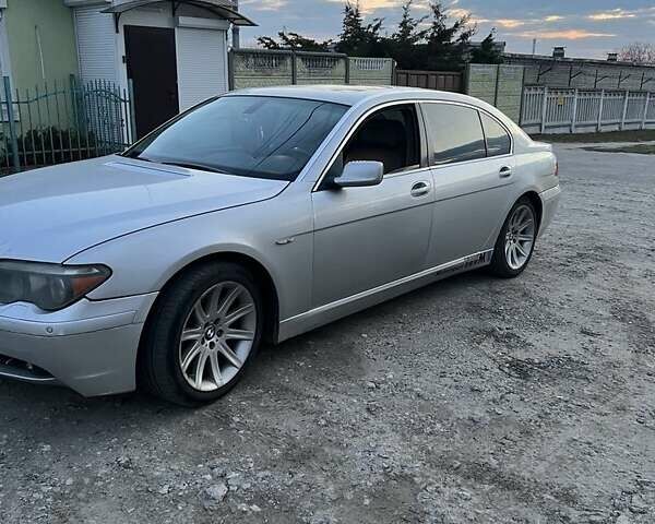 Серый БМВ 7 Серия, объемом двигателя 4.4 л и пробегом 330 тыс. км за 8500 $, фото 1 на Automoto.ua