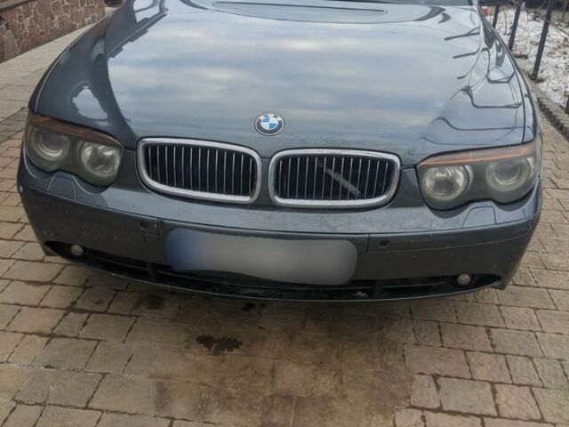 Серый БМВ 7 Серия, объемом двигателя 3 л и пробегом 100 тыс. км за 3500 $, фото 1 на Automoto.ua