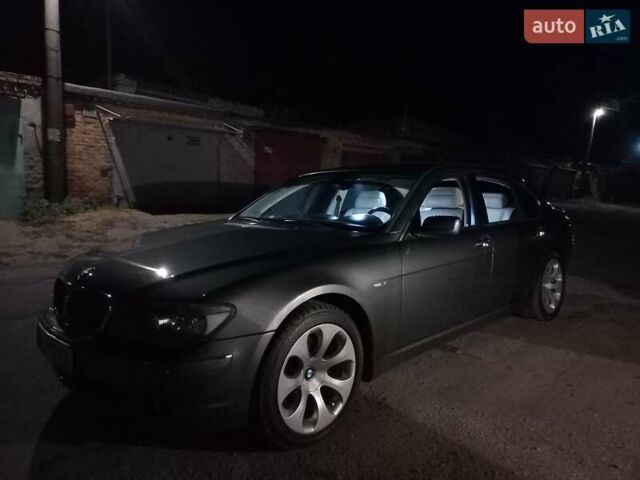 Сірий БМВ 7 Серія, об'ємом двигуна 4 л та пробігом 400 тис. км за 12000 $, фото 1 на Automoto.ua