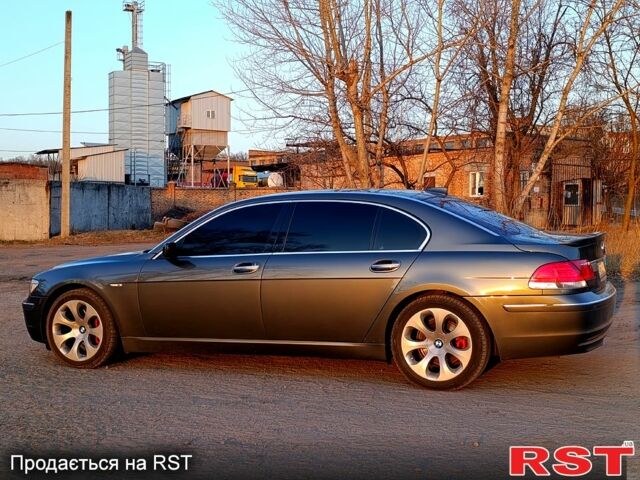 Серый БМВ 7 Серия, объемом двигателя 4 л и пробегом 200 тыс. км за 12000 $, фото 1 на Automoto.ua