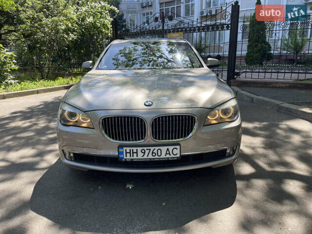Серый БМВ 7 Серия, объемом двигателя 4.39 л и пробегом 93 тыс. км за 15500 $, фото 1 на Automoto.ua