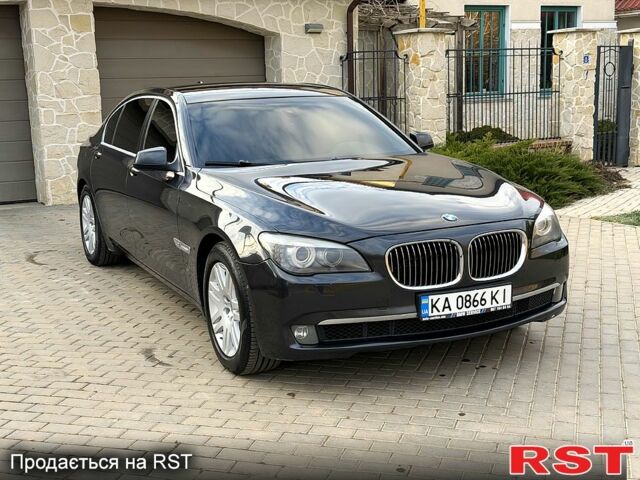 Серый БМВ 7 Серия, объемом двигателя 4.4 л и пробегом 224 тыс. км за 16500 $, фото 1 на Automoto.ua