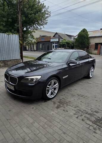 Серый БМВ 7 Серия, объемом двигателя 2.99 л и пробегом 280 тыс. км за 25000 $, фото 1 на Automoto.ua