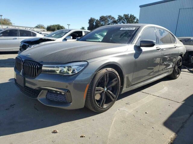 Серый БМВ 7 Серия, объемом двигателя 3 л и пробегом 69 тыс. км за 8000 $, фото 1 на Automoto.ua
