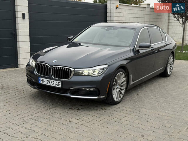 Серый БМВ 7 Серия, объемом двигателя 3 л и пробегом 89 тыс. км за 31400 $, фото 1 на Automoto.ua