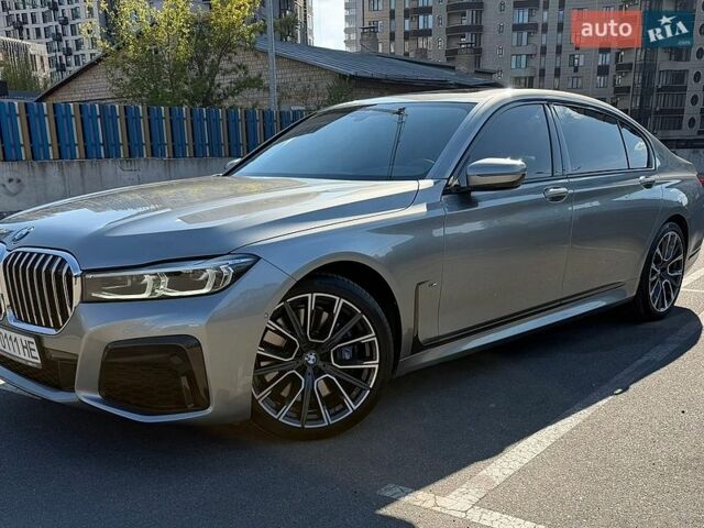 Серый БМВ 7 Серия, объемом двигателя 3 л и пробегом 102 тыс. км за 55900 $, фото 1 на Automoto.ua