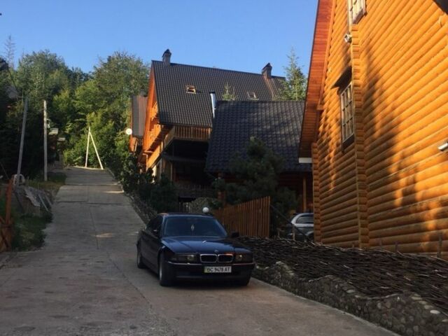 Синий БМВ 7 Серия, объемом двигателя 3 л и пробегом 368 тыс. км за 4000 $, фото 1 на Automoto.ua