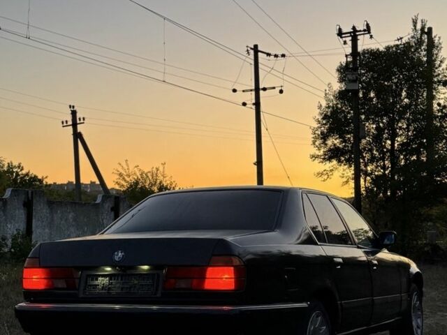 Синій БМВ 7 Серія, об'ємом двигуна 3.5 л та пробігом 3 тис. км за 1500 $, фото 1 на Automoto.ua