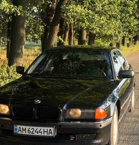 Синій БМВ 7 Серія, об'ємом двигуна 3 л та пробігом 390 тис. км за 3205 $, фото 1 на Automoto.ua