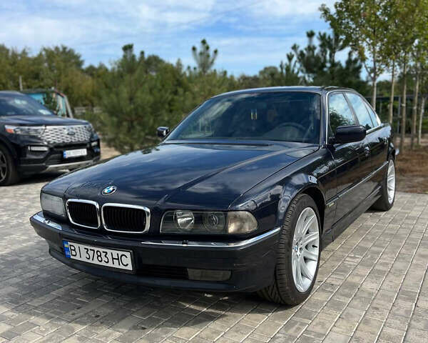 Синий БМВ 7 Серия, объемом двигателя 3 л и пробегом 200 тыс. км за 3450 $, фото 1 на Automoto.ua