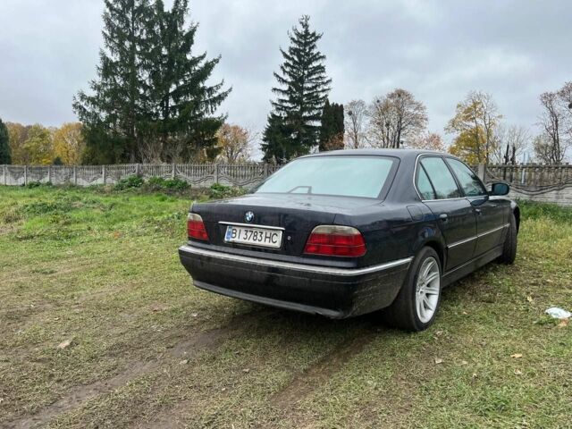 Синий БМВ 7 Серия, объемом двигателя 3 л и пробегом 500 тыс. км за 3400 $, фото 1 на Automoto.ua