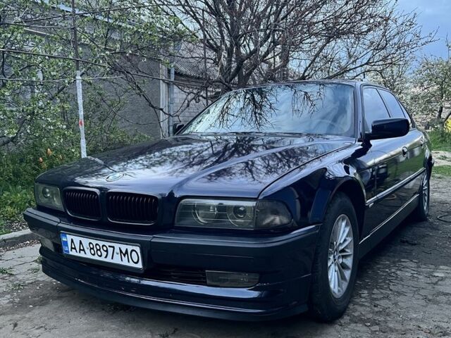 Синий БМВ 7 Серия, объемом двигателя 3 л и пробегом 450 тыс. км за 4000 $, фото 1 на Automoto.ua