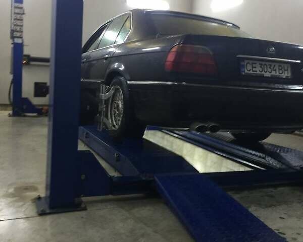 Синий БМВ 7 Серия, объемом двигателя 3 л и пробегом 368 тыс. км за 4000 $, фото 1 на Automoto.ua