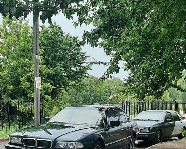 Синій БМВ 7 Серія, об'ємом двигуна 3.5 л та пробігом 999 тис. км за 5000 $, фото 1 на Automoto.ua