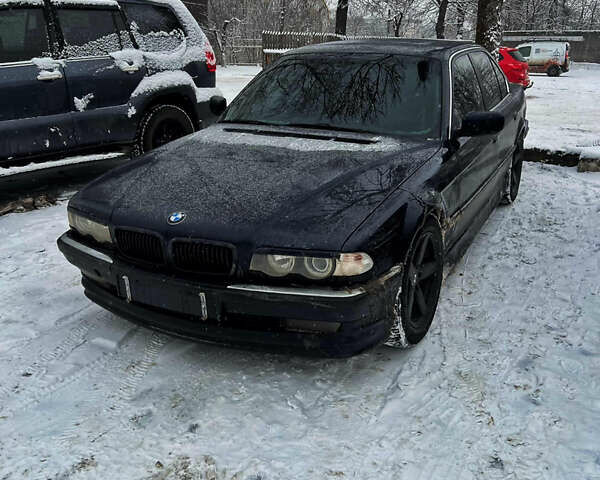 Синій БМВ 7 Серія, об'ємом двигуна 3 л та пробігом 451 тис. км за 6950 $, фото 1 на Automoto.ua