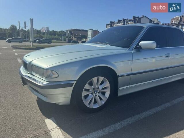 Синий БМВ 7 Серия, объемом двигателя 3 л и пробегом 395 тыс. км за 6800 $, фото 1 на Automoto.ua