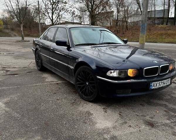 Синий БМВ 7 Серия, объемом двигателя 4.4 л и пробегом 470 тыс. км за 4600 $, фото 1 на Automoto.ua