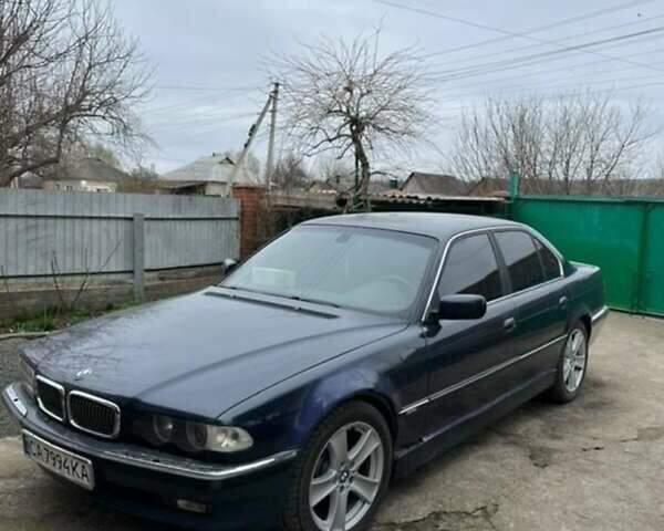 Синий БМВ 7 Серия, объемом двигателя 4.4 л и пробегом 247 тыс. км за 4000 $, фото 1 на Automoto.ua