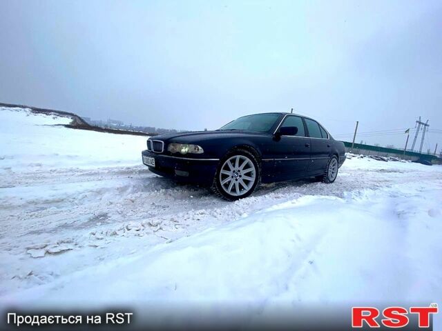 Синий БМВ 7 Серия, объемом двигателя 3.5 л и пробегом 340 тыс. км за 6900 $, фото 1 на Automoto.ua