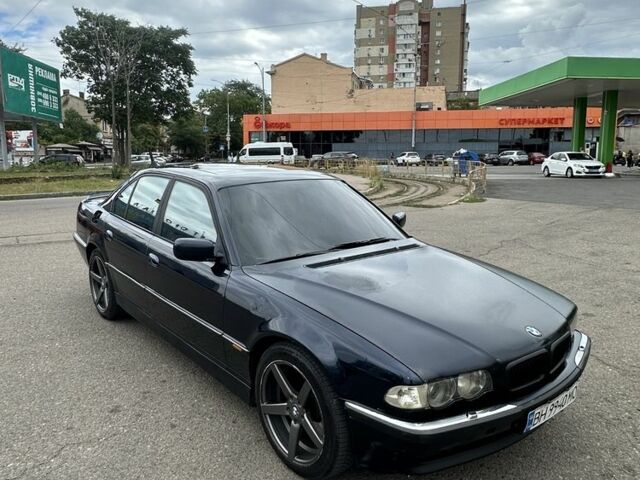 Синій БМВ 7 Серія, об'ємом двигуна 3 л та пробігом 300 тис. км за 4788 $, фото 1 на Automoto.ua