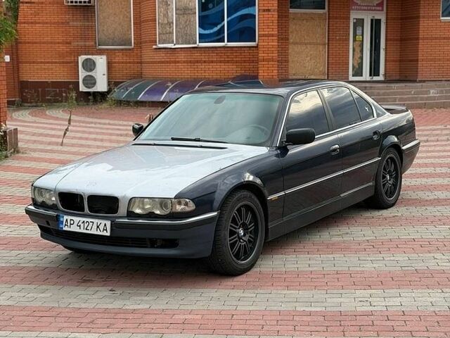 Синий БМВ 7 Серия, объемом двигателя 3.5 л и пробегом 249 тыс. км за 2500 $, фото 1 на Automoto.ua