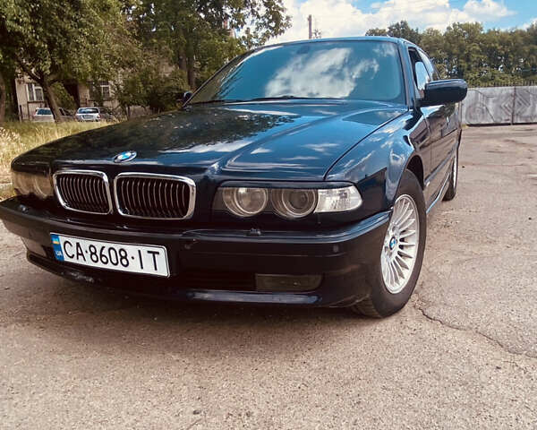 Синий БМВ 7 Серия, объемом двигателя 3.5 л и пробегом 439 тыс. км за 4900 $, фото 1 на Automoto.ua