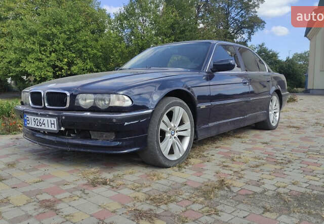 Синий БМВ 7 Серия, объемом двигателя 2.5 л и пробегом 300 тыс. км за 2500 $, фото 1 на Automoto.ua