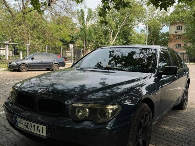 Синій БМВ 7 Серія, об'ємом двигуна 4.4 л та пробігом 270 тис. км за 6000 $, фото 1 на Automoto.ua
