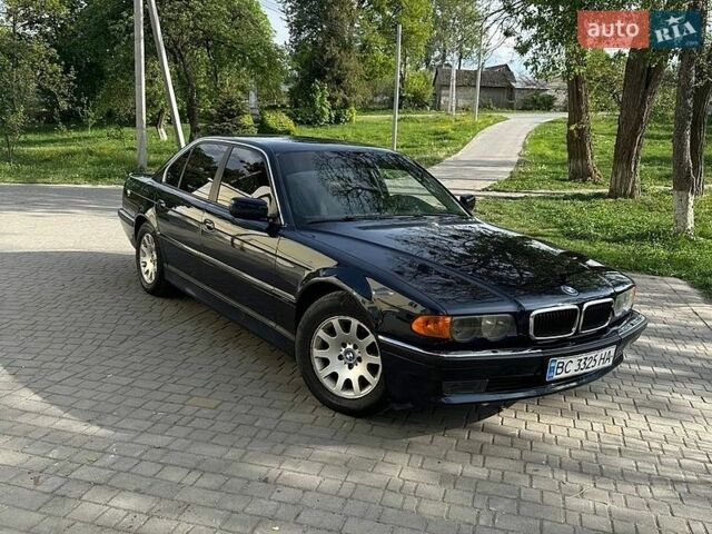 Синий БМВ 7 Серия, объемом двигателя 3 л и пробегом 435 тыс. км за 4850 $, фото 1 на Automoto.ua