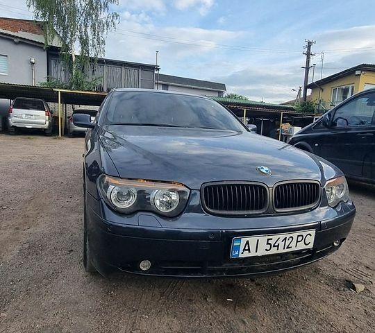 Синій БМВ 7 Серія, об'ємом двигуна 3.5 л та пробігом 360 тис. км за 3550 $, фото 1 на Automoto.ua